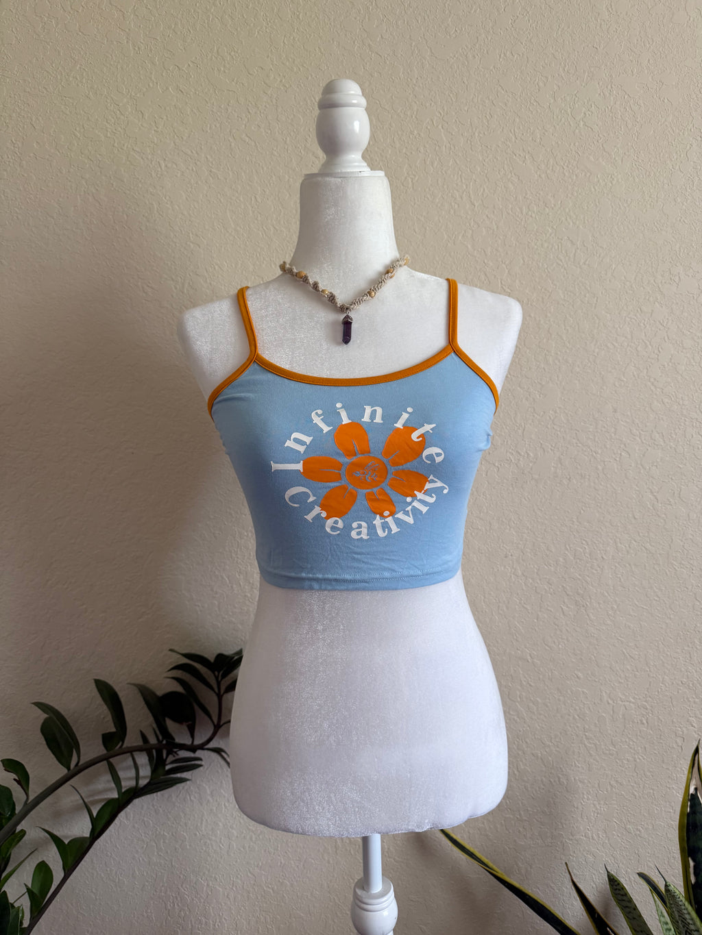 s infinite creativity crop tank