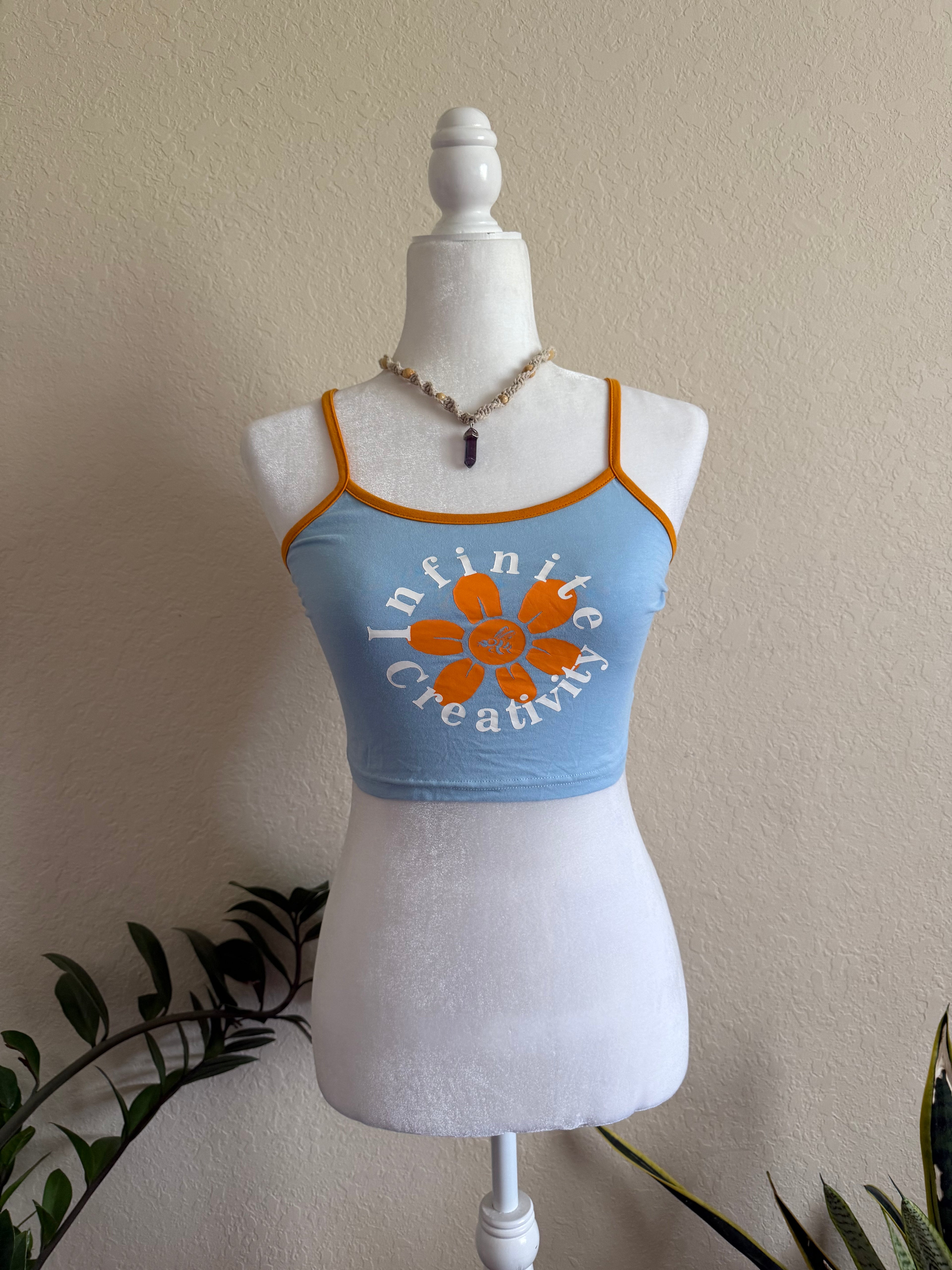 s infinite creativity crop tank