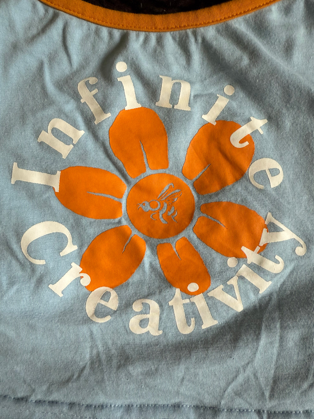 s infinite creativity crop tank